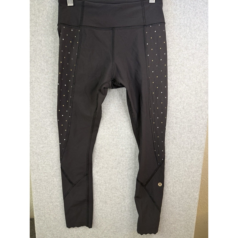 Lululemon athletica black leggings with Dot side panels